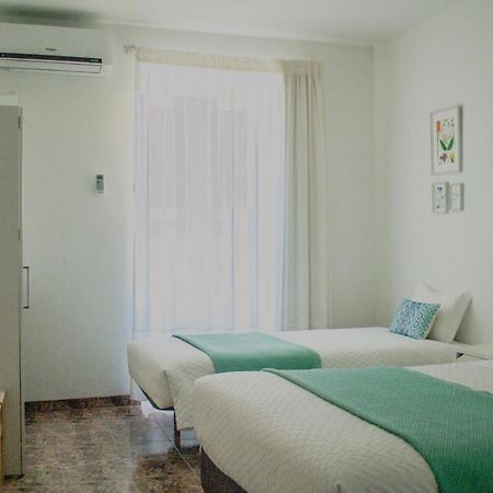 Residencial Avenida Hotel Faro Bagian luar foto