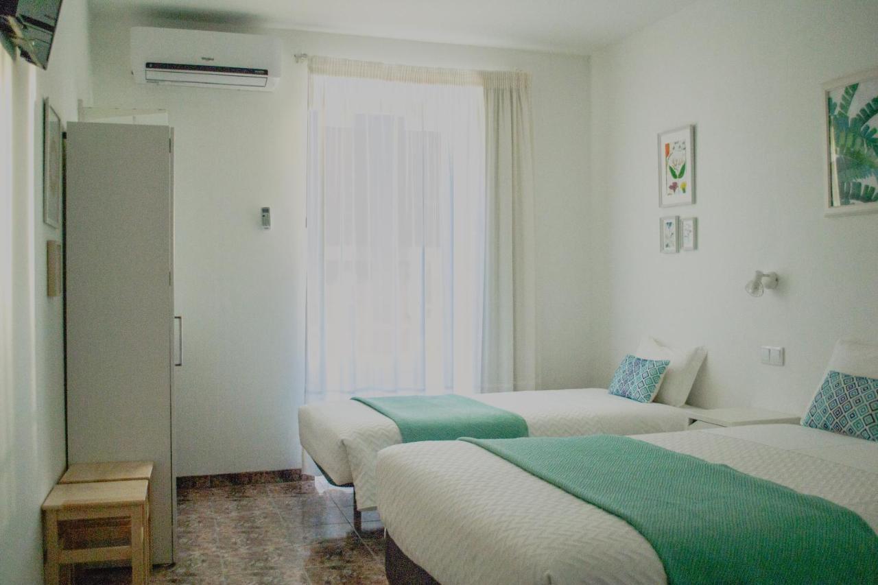 Residencial Avenida Hotel Faro Bagian luar foto